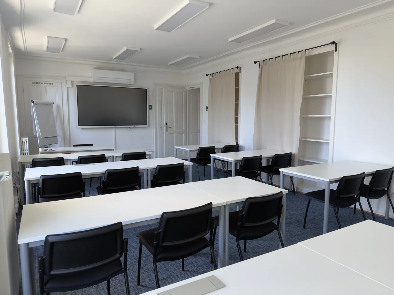 Salle LT-91 en configuration plénière jusqu'à 22 personnes à Lausanne
